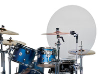 A blue DW drum set with 24 inch cymbal shield mounted to a cymbal stand to block the sound from a cymbal