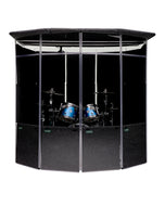 A MiniMegaPac isolation booth with inner Sorber sound absorption panels and a LidPac on top isolating a blue DW drum kit.