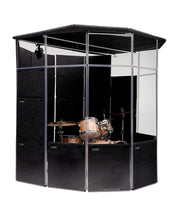 An angled view of the MegaPac isolating a PDP drum kit with acrylic drum shields and Sorber sound absorption baffles. 