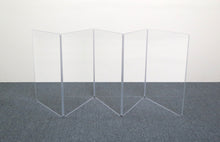 The A2436x5 3' H, 5-panel amp shield on carpet in front of a white wall.