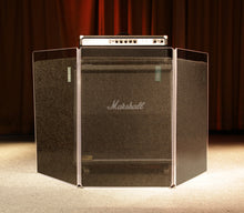 A 3-panel amp shield with sound absorption lowering the volume of a Marshall half stack.