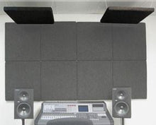 SC2224 cloud absorption baffles being used as ceiling acoustic treatment above a recording console.
